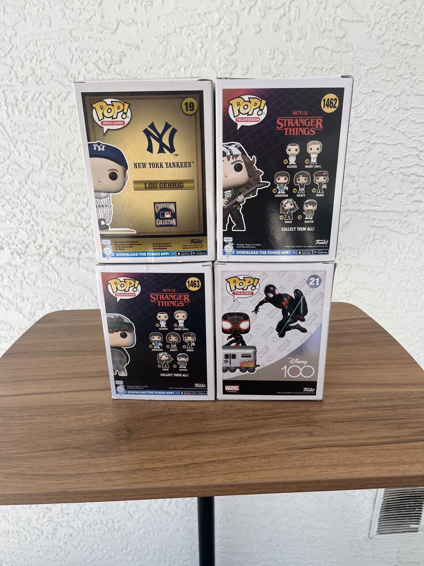 Funko Pops Eddie, Dustin, Lou Gehrig , Miles Morales On Subway Car
