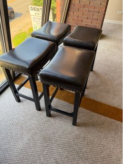 One set of four and one set of two barstools