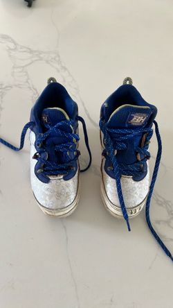 Youth size 13K under armor baseball cleats