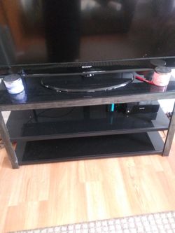 60 in Sharp flat screen TV with TV stand