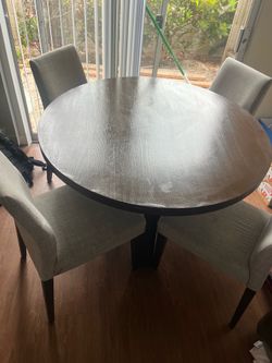 Four person round dining table