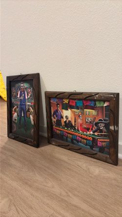Two day of the dead art pieces