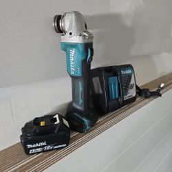 MAKITA 18V BRUSHLESS WITH 18V 4AH BATTERY  AND CHARGER MOD#XAG04