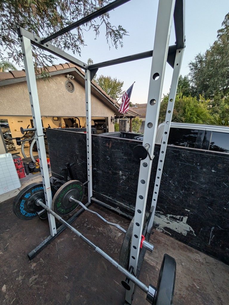 Squat Rack, And Weights