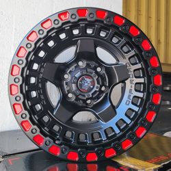 17X9.0 DIM 6x139 CB. MATTE BLACK / RED BLACK LIP WHEELS