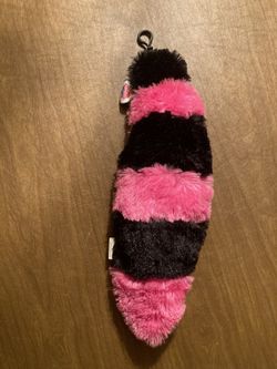 NewTags still attached. Jeans Raccoon tail