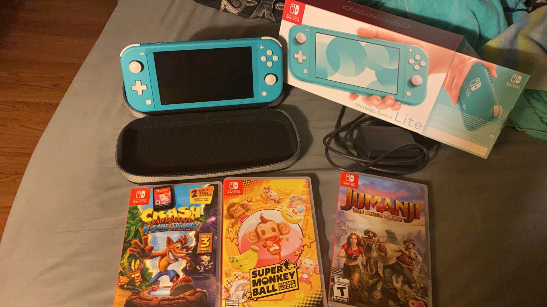Nintendo Switch Lite Barely Used With 4 Games & Carrying Case