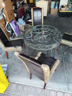 Glass table with chairs