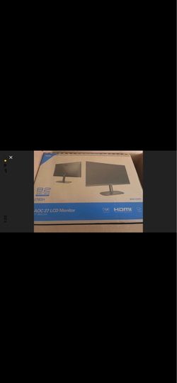 2 computer monitors with stands