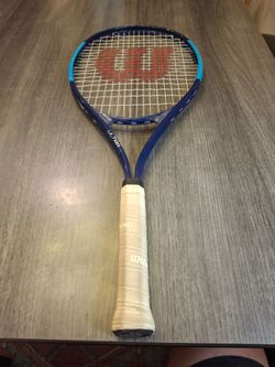 The Wilson Ultra Power XL 112 Adult Tennis Racket is a high-quality racquet designed for adult tennis players looking for power and control. With its