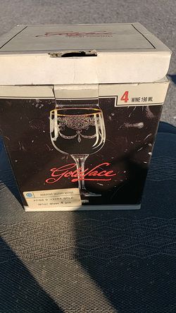 Brand new set of 4 crystal wine glasses