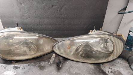 1998 Mercury sable headlight housings pair