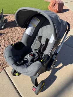 Doona -$75 Stroller + Car base (grey)