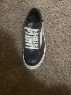 Black Low-Top Sneaker with White Sole