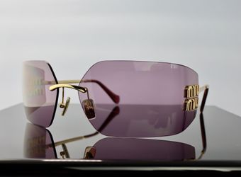 Miu Miu Oversized Runway Sunglasses in Purple Brown