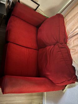 RED Love seat pull out twin bed USED