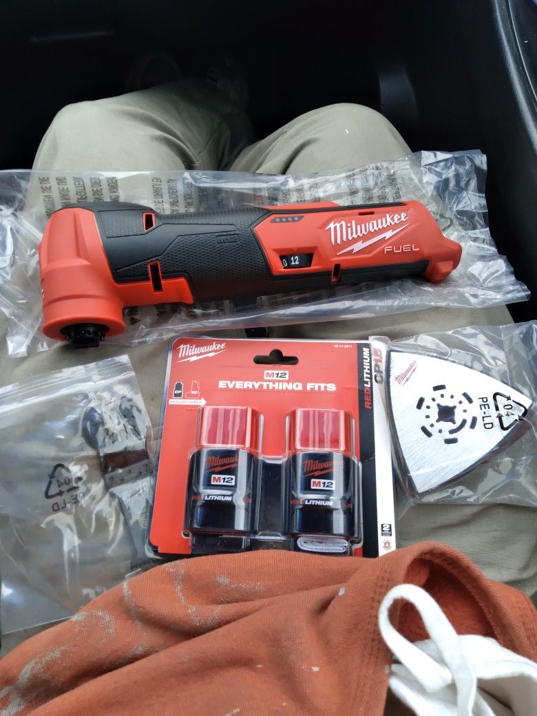 Milwaukee M12 Multitool And 2 Pack Batteries Brand New