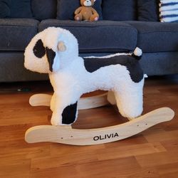 OLIVIA, BRANDED CUTE ROCKING DOG FOR CUTE KIDS. EXCELLENT CONDITION, SLIGHTLY USED $30