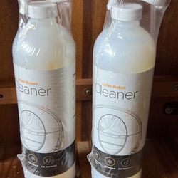 Two bottles of the litter robot cleaner. 