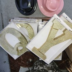 Boxes with different decorations for birthdays, baby showers, and gender reveals