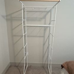 White over washer storage shelves 