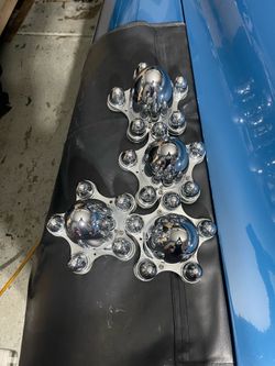 Speedway Bullet-Style Spider Cap Wheel Hub Covers, 5 on 5-1/2 Inch off a 1953 Chevrolet