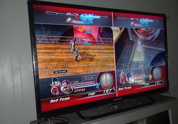 Flat Screen Tv And PlayStation 3 With 1 Controller And 3 Games