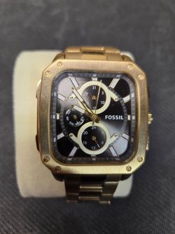Gold and Black Fossil watch