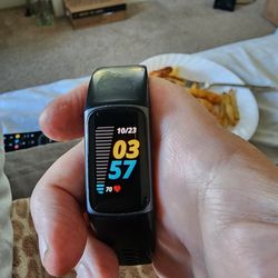 Fitbit Charge 5 with charger