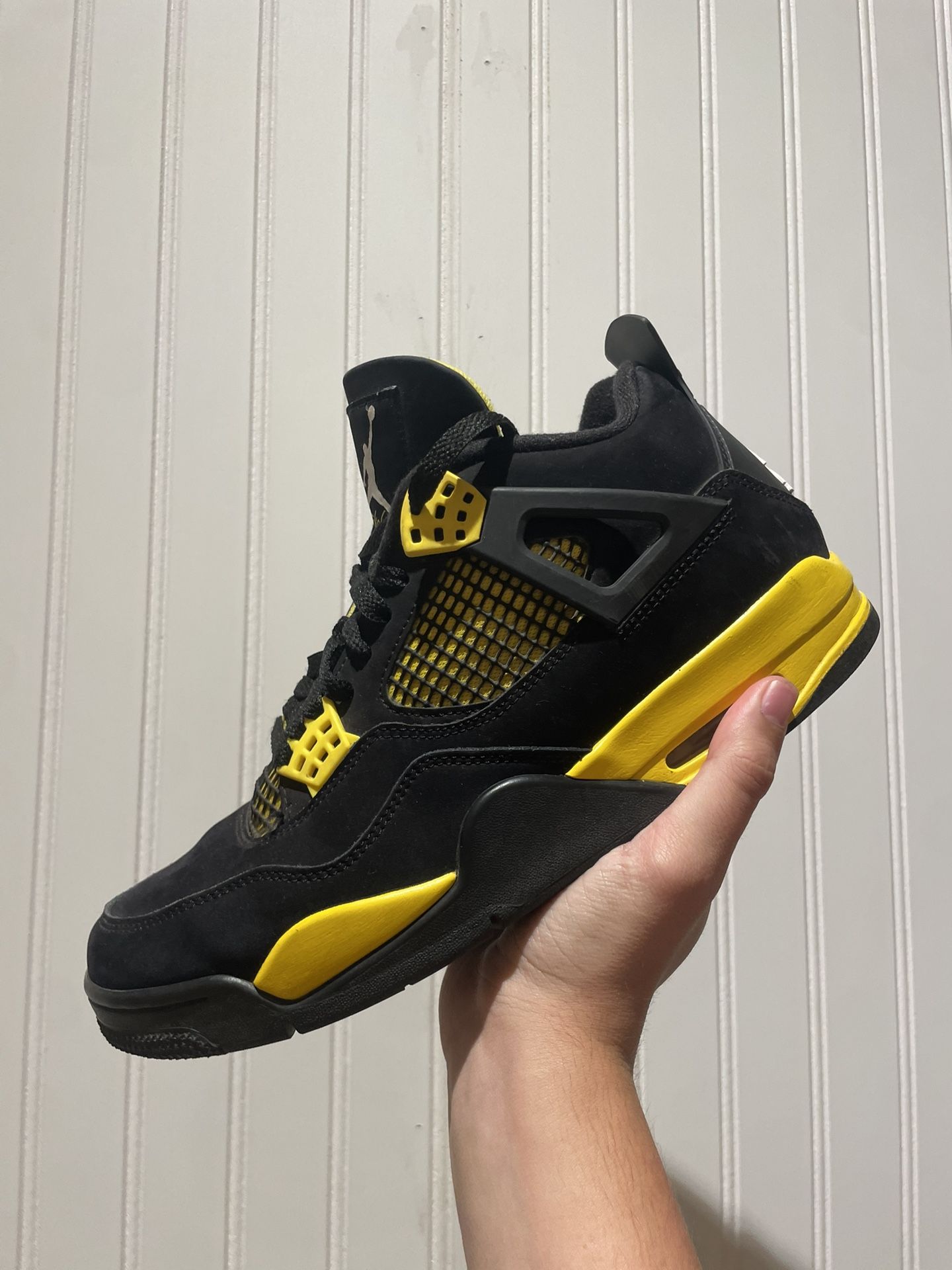 Size 9.5 Jordan 4 Thunder