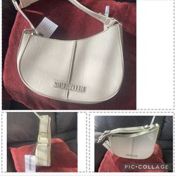 Half moon taupe Steve Madden  great for work or any ocassion.  NEW