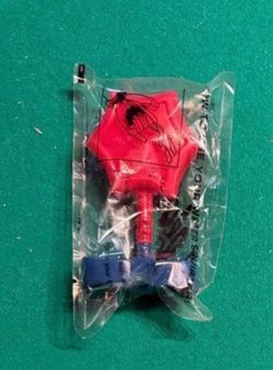 vintage Kellogg's Spider-Man Web Shooter Water Squirter promotion toy from 2001–2002, packaged inside a clear plastic wrapper.