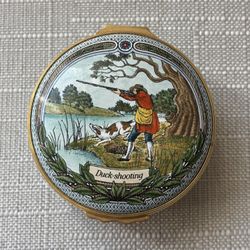 Halcyon Days enamel trinket box featuring a "Duck-shooting" scene.