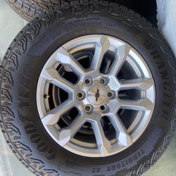 4 Goodyear Wrangler Territory AT  Tires on Chevrolet 18” Wheels
