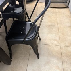 Metal Chairs And Wooden Table 