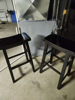 2 saddleback bar height stools distressed black finish