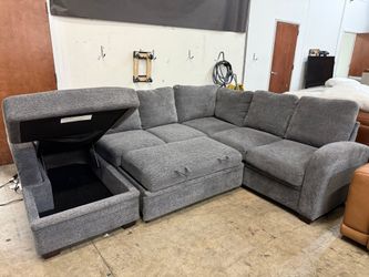 Sleeper Sectional with Reversible Chaise and Storage