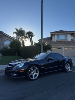 Beautiful Majestic Black over Beige leather SL550 with only 71,500 original miles and just 3 owners since new