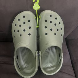Crocs Sz 7M  9W