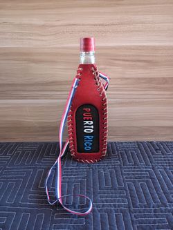 VINTAGE MID CENTURY HAND WRAPPED TOOLED LEATHER WRAPPED DECANTER BOTTLE
