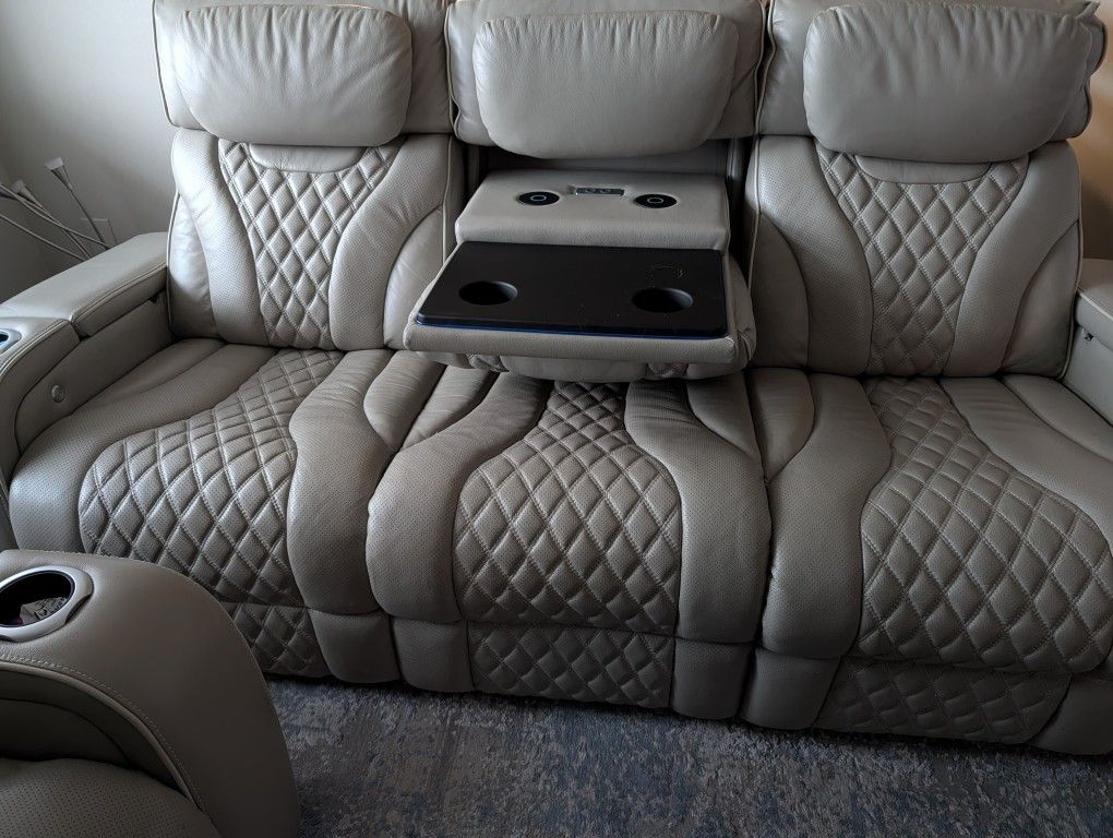 Leather Sofa With Recliner. 