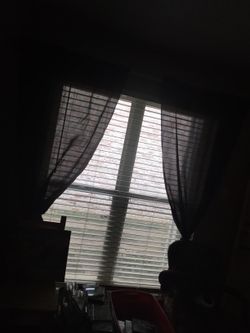 Brown Curtains With Large Rod And Mounts 