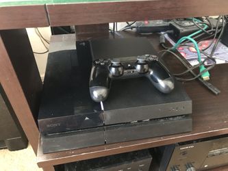 Sony PlayStation PS4 with Controller And 5 Games Bundle And Cables
