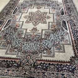 Pair Of Rectangular And One Matching Round Area Rugs 