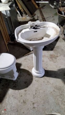 White Ceramic Pedestal Sink with Faucet