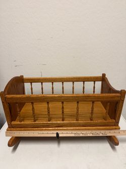 Vintage baby doll rocking cradle