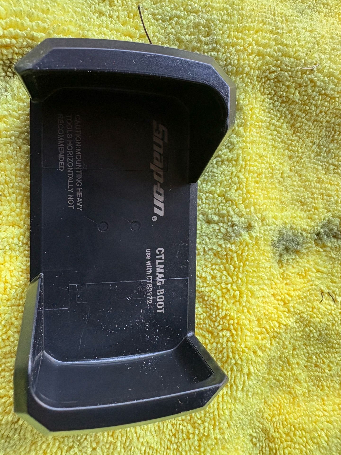 Magnetic boot snap on