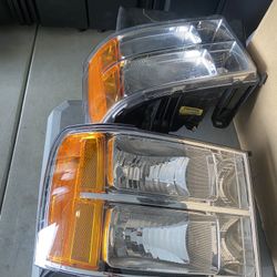 07-13 GMC Sierra Headlights