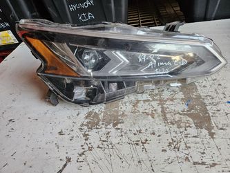 Nissan Altima right headlight lid oem