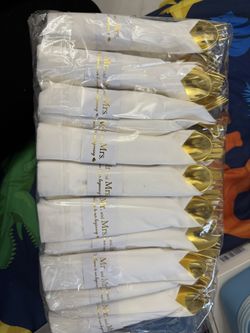 mr. and mrs napkins with spoon for and knife